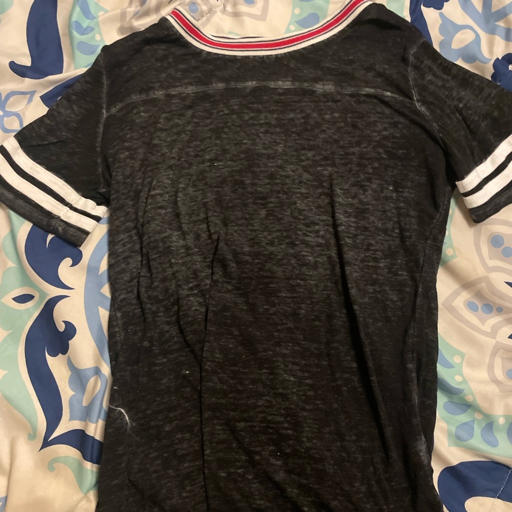 this is from pink rose and it’s soft. The colors are black white and red. Size S